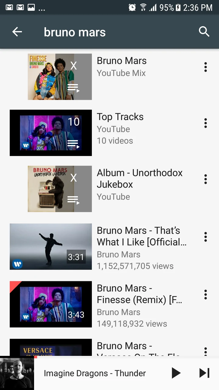 Archived YMusic developer screenshot showing Bruno Mars search results, mixes, playlists and a bottom mini player.